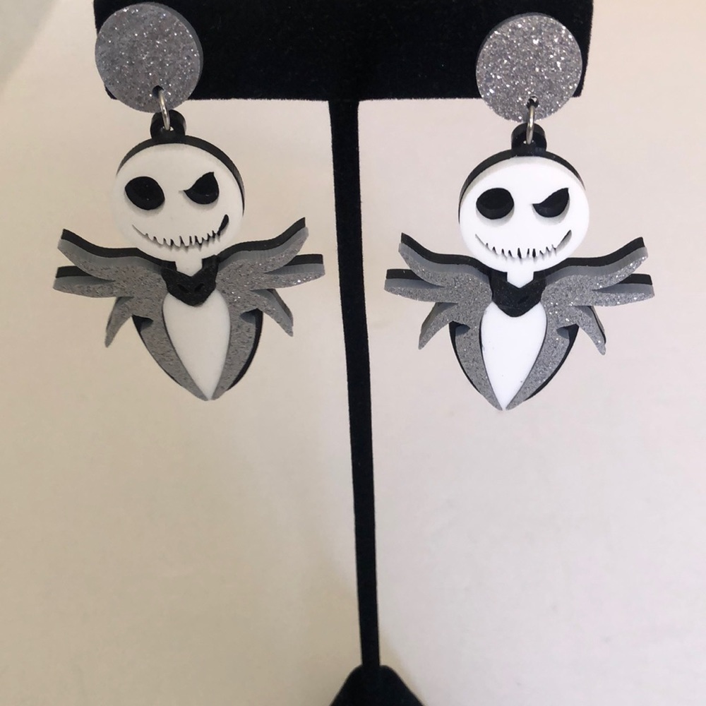 Jack inspired whimsical skeleton pierced dangle earrings.